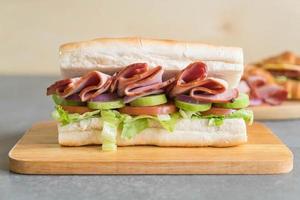 Ham and salad submarine sandwich photo