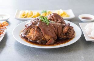 Stewed pork leg in gravy soup photo