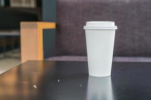 Hot coffee cup in coffee shop photo