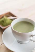 A cup of matcha latte green tea photo