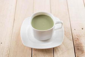 A cup of matcha latte green tea photo