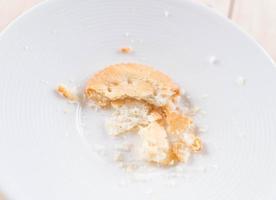 Crackers or biscuits on white plate photo