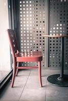 Empty chair in coffee shop - vintage effect filter photo