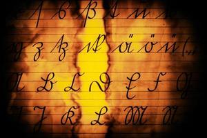 Vintage old Latin Alphabets on Paper Background photo