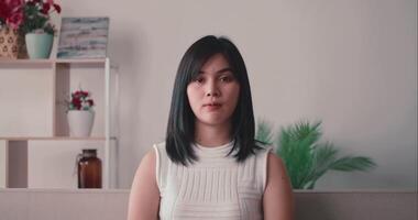 Young Woman Smiles Happily in Living Room video