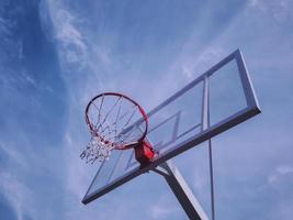 Basketball backboard against the sky. Outdoor sports construction.