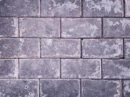 Paving slabs covered with stains from anti-icing chemical reagents. photo