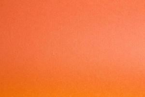 Empty copy space from colored paper.orange color sheet background photo