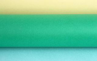 Roles of color paper background photo