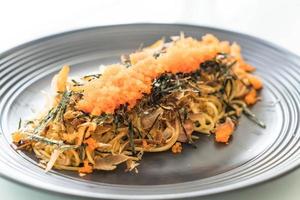 Spaghetti Japanese sausage with tobiko - fusion food photo