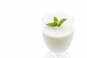 A glass of yogurt  on white background photo