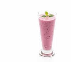 Mixed berries with yogurt smoothies on white background photo