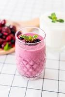 Mixed berries with yogurt smoothies on the table photo