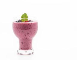 Mixed berries with yogurt smoothies on white background photo