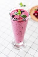 Mixed berries with yogurt smoothies on the table photo