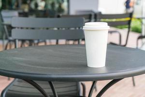 Hot coffee cup in coffee shop photo