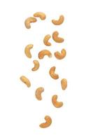 Cashew nuts falling isolated on white background with clipping path photo