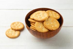 Cracker cookies on wooden table background photo