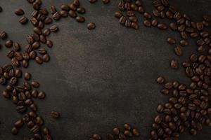 Coffee beans on grunge background photo