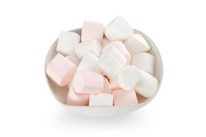 Marshmallow in bowl isolated on white background with clipping path photo