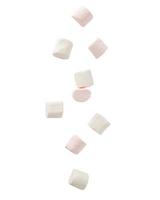 Marshmallow falling isolated on white background with clipping path photo