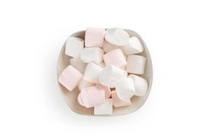 Marshmallow in bowl isolated on white background with clipping path photo