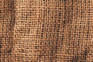 Flax burlap texture background, detailed closeup view photo