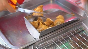 Cutting fried fish ball video