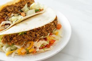 Mexican tacos with minced chicken photo