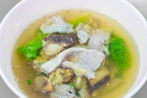 Pork with veggies in soup photo