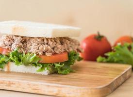 Tuna sandwich on wood board photo