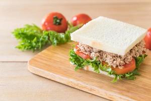 Tuna sandwich on wood board photo