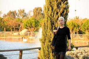 Blond Woman in the Park in Green Nature photo
