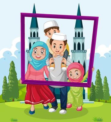 Happy family holding photo frame with mosque on the background