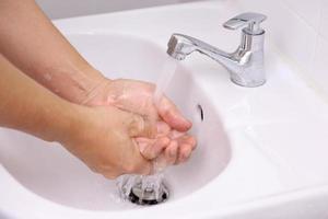 Washing Hands in The Sink