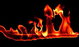 Fire flame on blackground photo