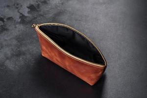 Beautiful leather brown purse made of leather to store paper money photo