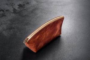 Beautiful leather brown purse made of leather to store paper money photo