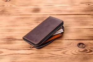 Beautiful leather brown purse made of leather to store paper money photo