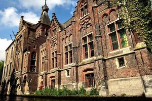 An old building on the canal waterfront photo