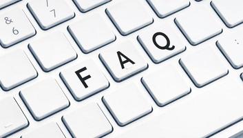 FAQ or Frequently Asked Questions word on modern computer Keyboard photo