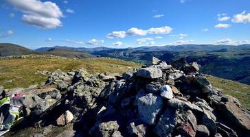 Walkers rucksack and the cairn on Base Brown photo