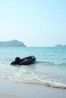 inflatable motor boat on the beach