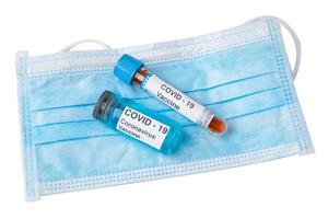vacuna contra el virus covid-19 o coronavirus en la máscara. foto