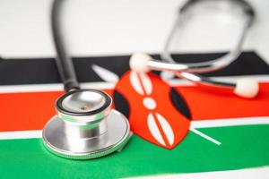 Black stethoscope on Kenya flag background,
