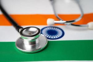Black stethoscope on India flag background, photo
