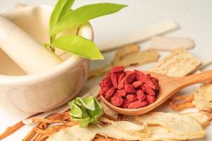 Chinese herb medicine with goji berries for good healthy. photo