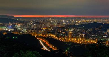 Sunset high angle view of the cityscape from Wenshan District at Taipei, Taiwan photo