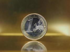 1 euro coin, European Union over gold background photo