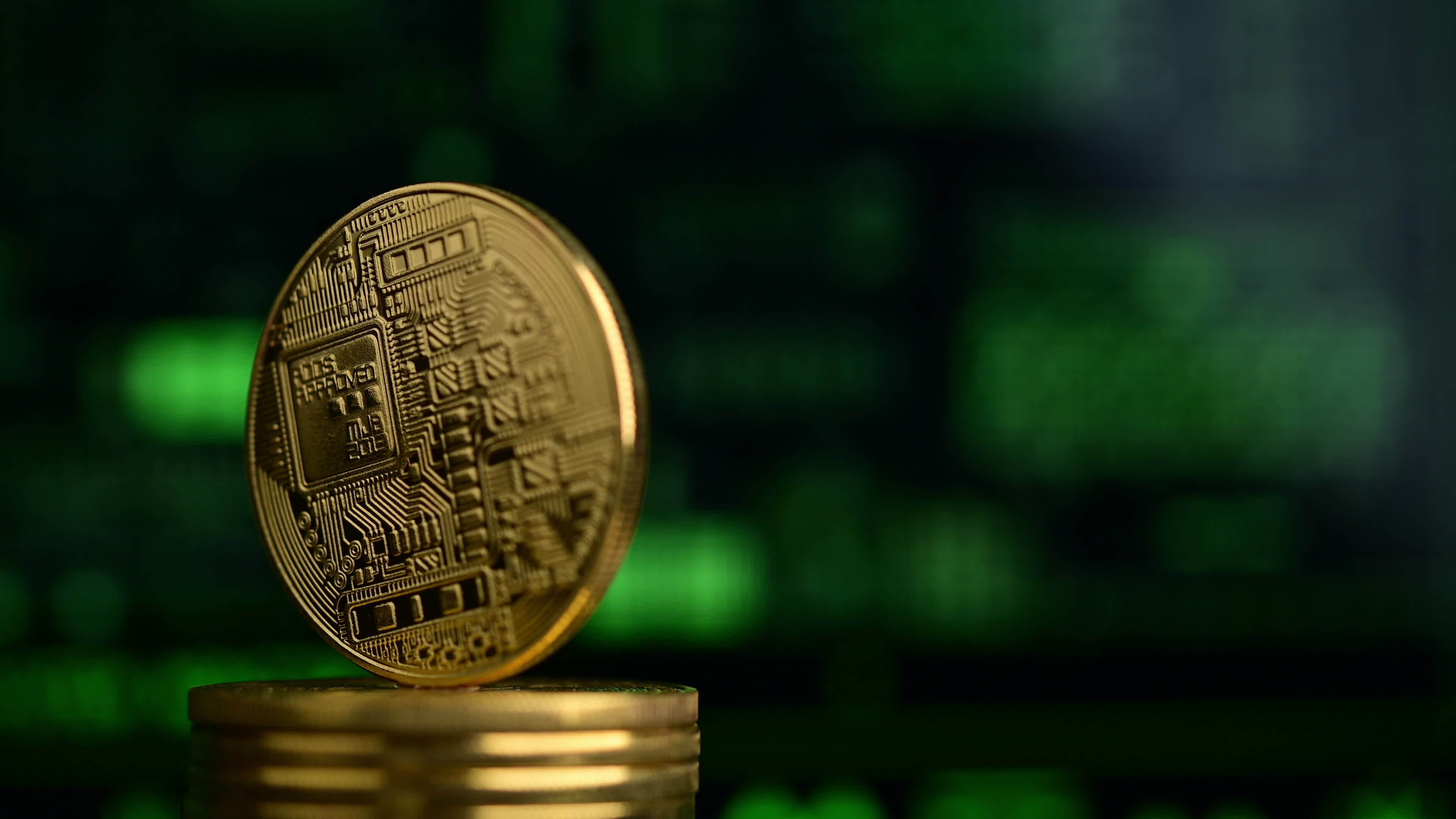 Cryptocurrency Bitcoin Physical Coin Spins 3121027 Stock Video at Vecteezy